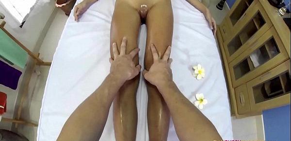  Skinny Oriental allows masseur to roam her naked body